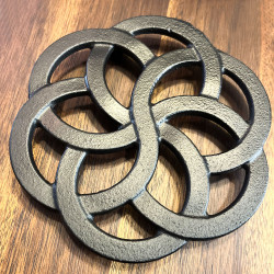 Dessous de théière en fonte